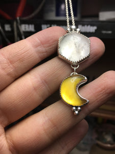 Hexagonal quartz crystal with Mexican amber moon