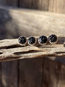 Carved black onyx flower studs