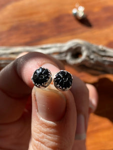 Carved black onyx flower studs